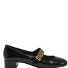 Black patent leather Baby D ballet Mary Jane pumps with logo plaque strap