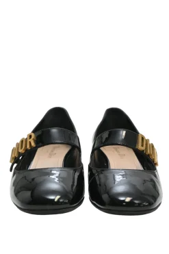 Black patent leather Baby D ballet Mary Jane pumps with logo plaque strap