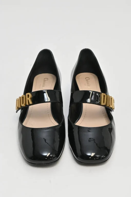 Black patent leather Baby D ballet Mary Jane pumps with logo plaque strap