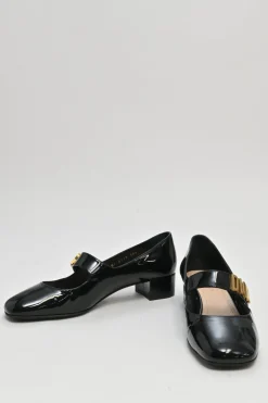 Black patent leather Baby D ballet Mary Jane pumps with logo plaque strap