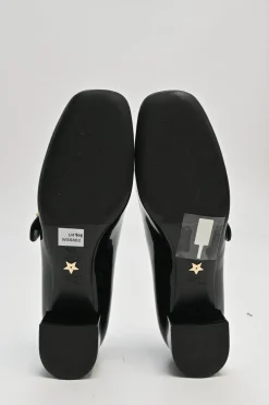 Black patent leather Baby D ballet Mary Jane pumps with logo plaque strap