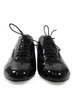 Black patent leather lace-up brogues with Coco Mark ankle plaque and sculpted camellia block heel