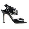 Black patent leather open high-heel pump with silver over-sized buckle detail