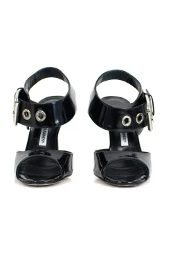 Black patent leather open high-heel pump with silver over-sized buckle detail