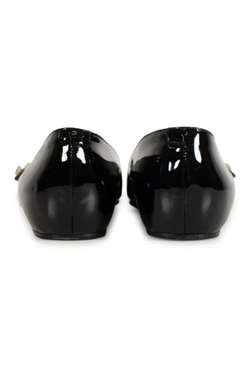 Black patent leather pointed toe double strap Aneta flat pumps with GG buttons at vamps