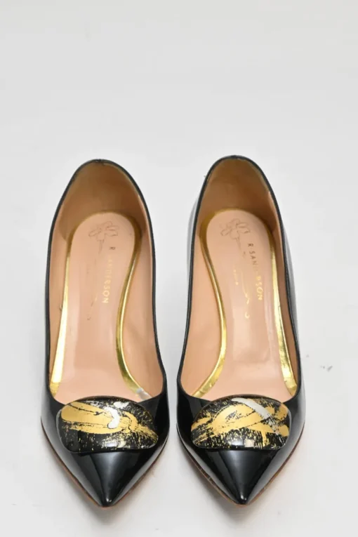 Black patent leather pointed-toe mixed-metal pebble pumps