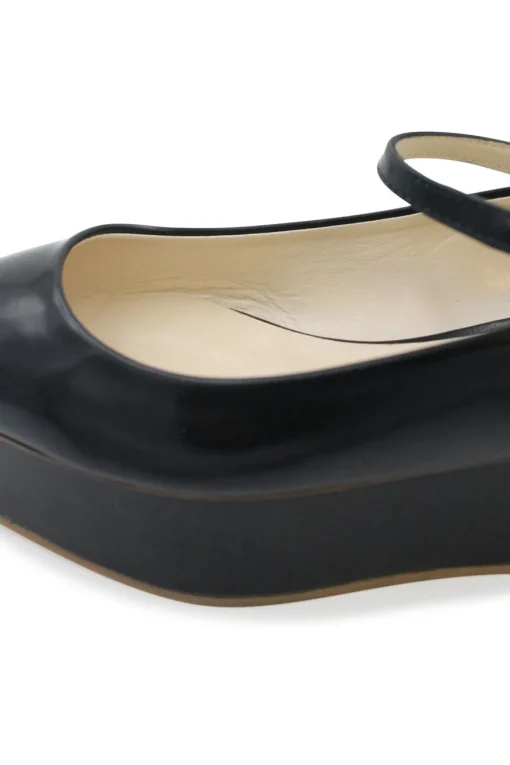 Black patent leather pointy toe platform slip on steps