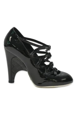 Black patent leather round-toe sculpted Mary Jane pumps
