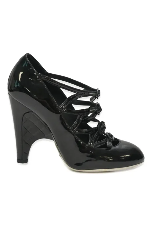 Black patent leather round-toe sculpted Mary Jane pumps