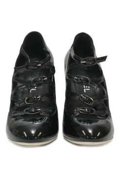 Black patent leather round-toe sculpted Mary Jane pumps