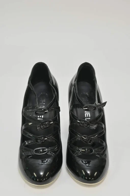 Black patent leather round-toe sculpted Mary Jane pumps