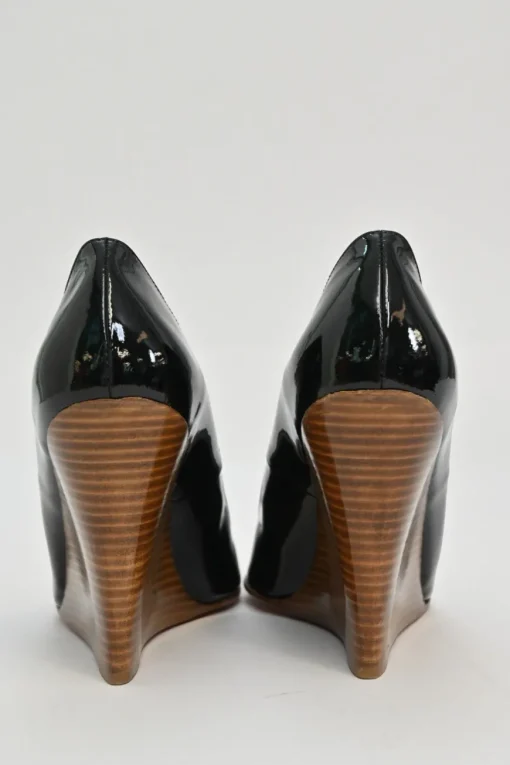 Black patent leather round-toe wedge pumps