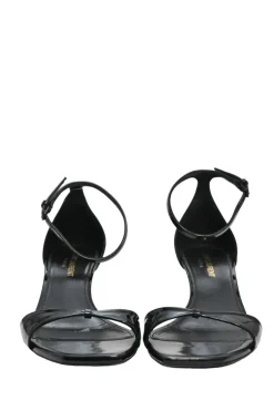 Black patent leather square-toe kitten heel sandals with buckle strap fastening