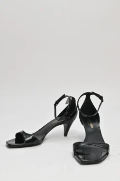 Black patent leather square-toe kitten heel sandals with buckle strap fastening