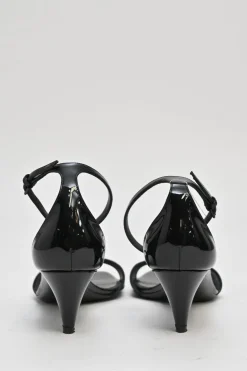 Black patent leather square-toe kitten heel sandals with buckle strap fastening