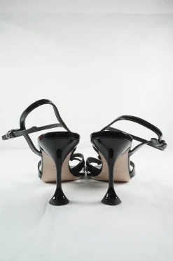 Black patent leather strappy bow heeled sandals with adjustable buckle ankle strap