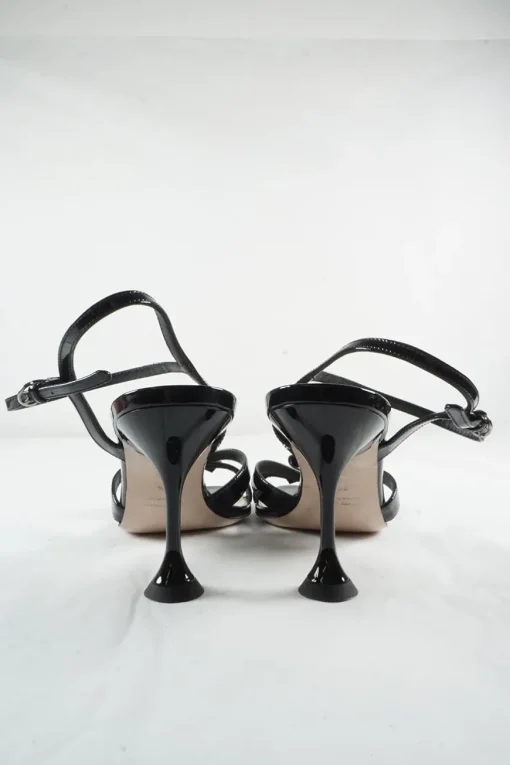 Black patent leather strappy bow heeled sandals with adjustable buckle ankle strap