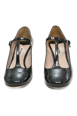 Black patent leather T-strap Mary Jane block heel pumps with crystal-embellished heel
