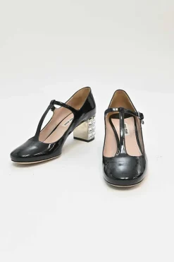 Black patent leather T-strap Mary Jane block heel pumps with crystal-embellished heel