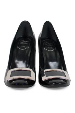 Black patent round toe pump with silver-tone signature square buckle