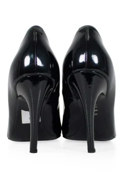 Black patent round toe pump with silver-tone signature square buckle