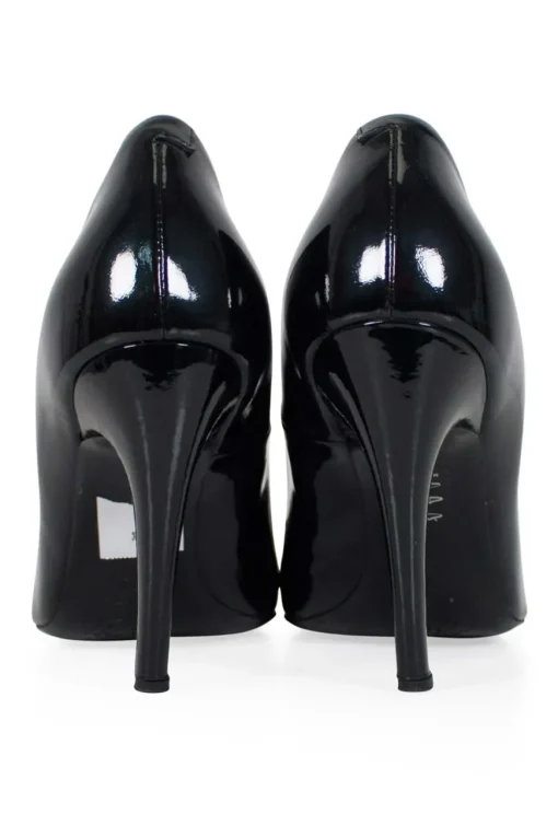 Black patent round toe pump with silver-tone signature square buckle