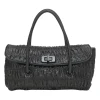 Black patina leather capretto gaufre shoulder flap bag with turn-lock fastening