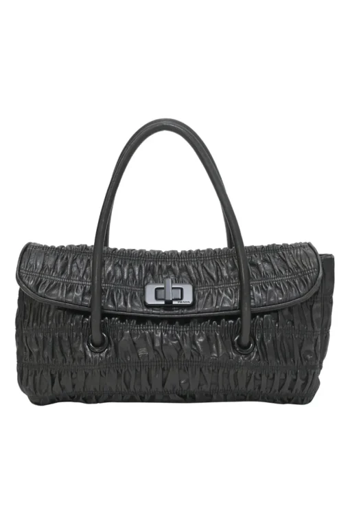 Black patina leather capretto gaufre shoulder flap bag with turn-lock fastening