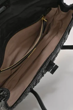 Black patina leather capretto gaufre shoulder flap bag with turn-lock fastening