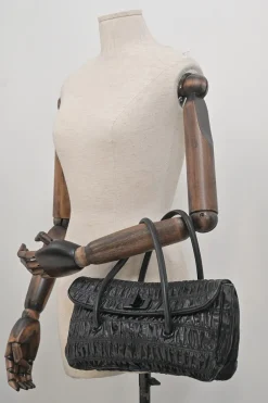 Black patina leather capretto gaufre shoulder flap bag with turn-lock fastening