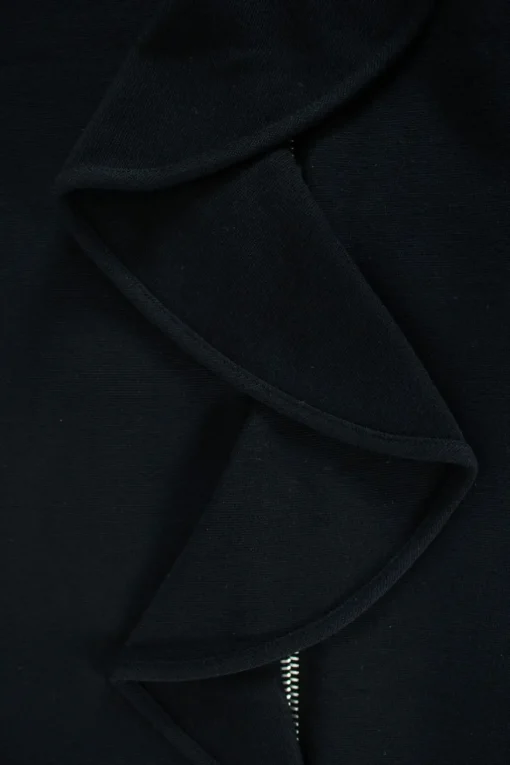Black pencil skirt with ruffle down one side and silver zip through