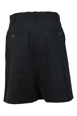 Black pinstripe wool singe breasted notch lapel tailored jacket and pull-on high-rise skirt suit set