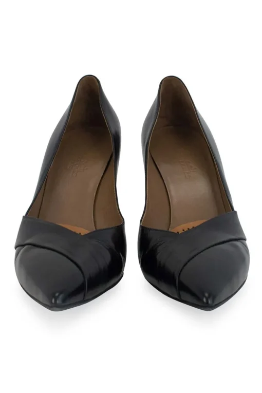 Black pointed toe pumps