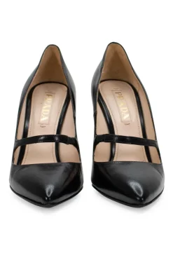 Black pointy leather high heel with strap vamp