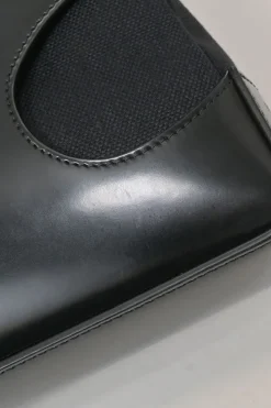 Black polished calfskin and canvas Cutout shoulder bag