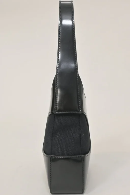 Black polished calfskin and canvas Cutout shoulder bag