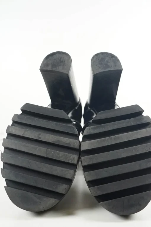 Black polished calfskin and rubber lace-up Star Trail combat-style block heel ankle boots