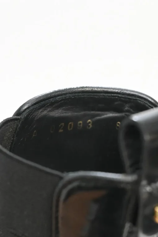 Black polished calfskin and rubber Vasi pull-on combat Chelsea flatform boots with tread soles