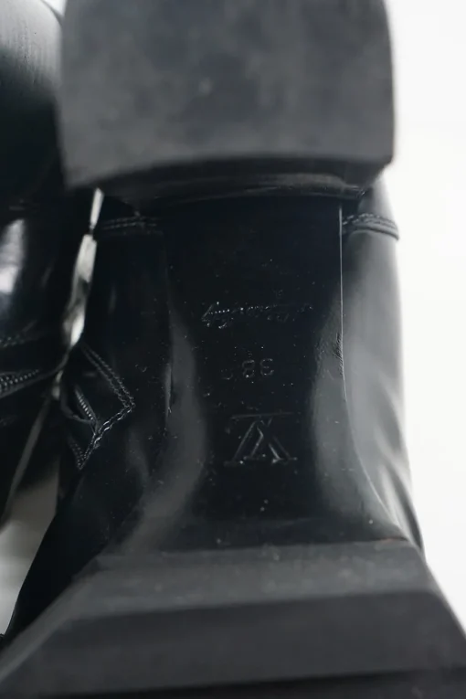 Black polished calfskin and rubber lace-up Star Trail combat-style block heel ankle boots