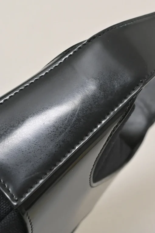 Black polished calfskin and canvas Cutout shoulder bag