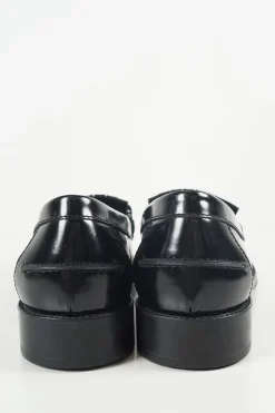 Black polished calfskin double T buckle fringe loafers with textured rubber soles