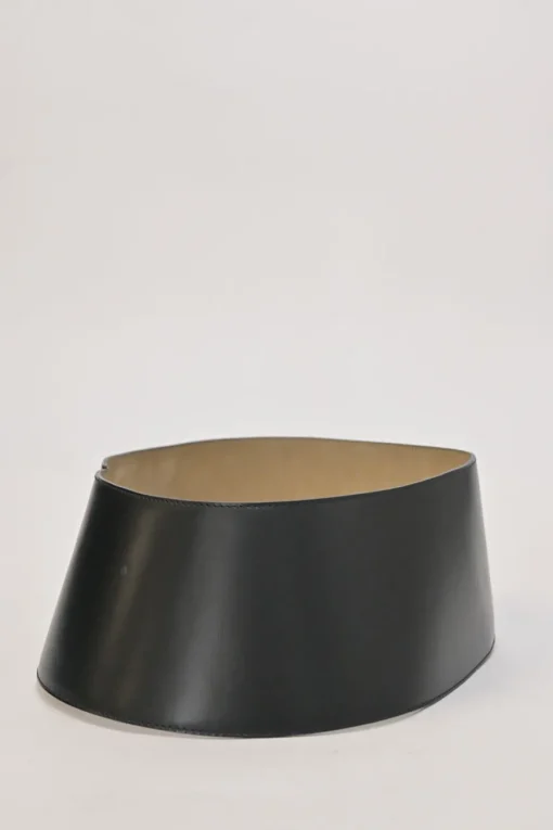 Black polished calfskin harness-style belt with stacked hook and eye closure