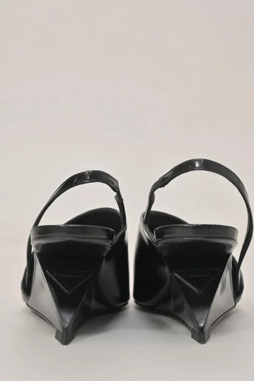 Black polished calfskin half D'Orsay pointed-toe slingback angular wedge mules