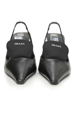 Black polished calfskin pointed-toe logo tongue slingback pumps