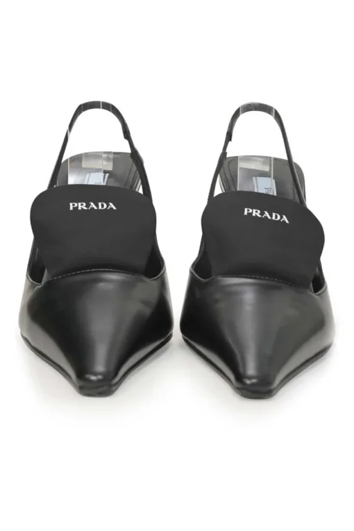 Black polished calfskin pointed-toe logo tongue slingback pumps
