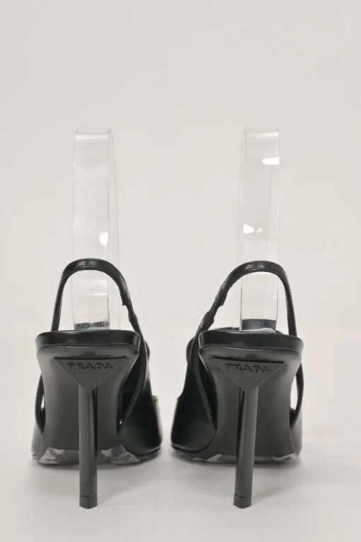 Black polished calfskin pointed-toe logo tongue slingback pumps