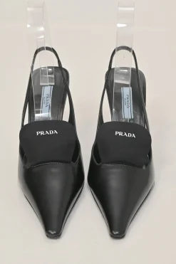 Black polished calfskin pointed-toe logo tongue slingback pumps