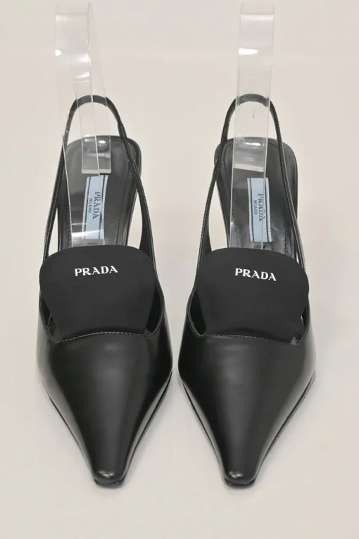 Black polished calfskin pointed-toe logo tongue slingback pumps