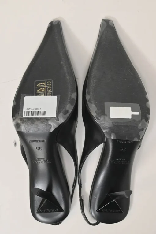 Black polished calfskin pointed-toe logo tongue slingback pumps