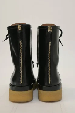 Black polished leather and rubber Jamie lug sole lace-up moc toe flatform wedge boots